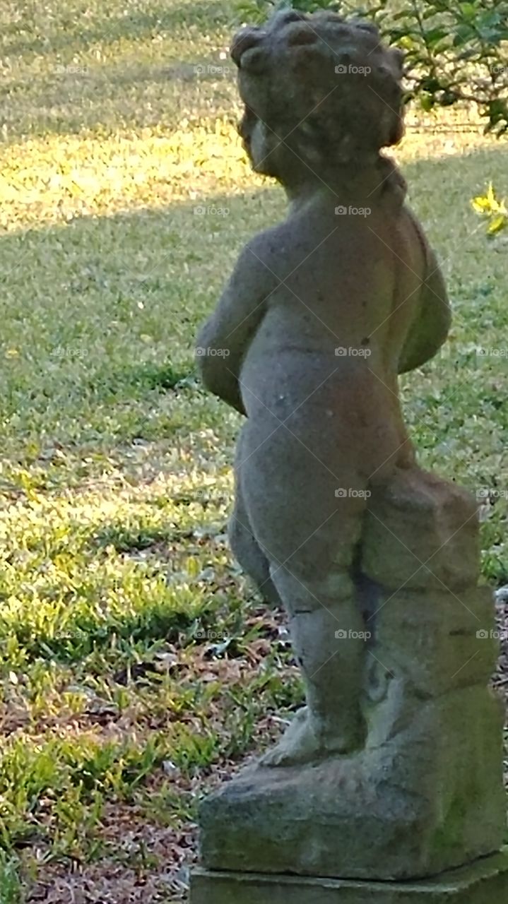 Garden sculpture of the chubby woman