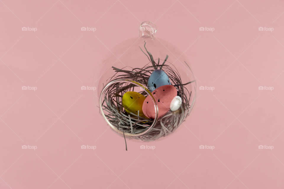 Easter eggs in floatin glass nest