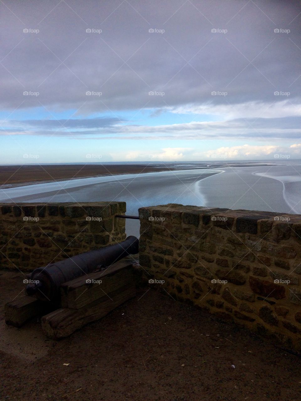 Mont Saint Michel - Cannon. Views over the water, beautiful sky. Peaceful, tranquil. 