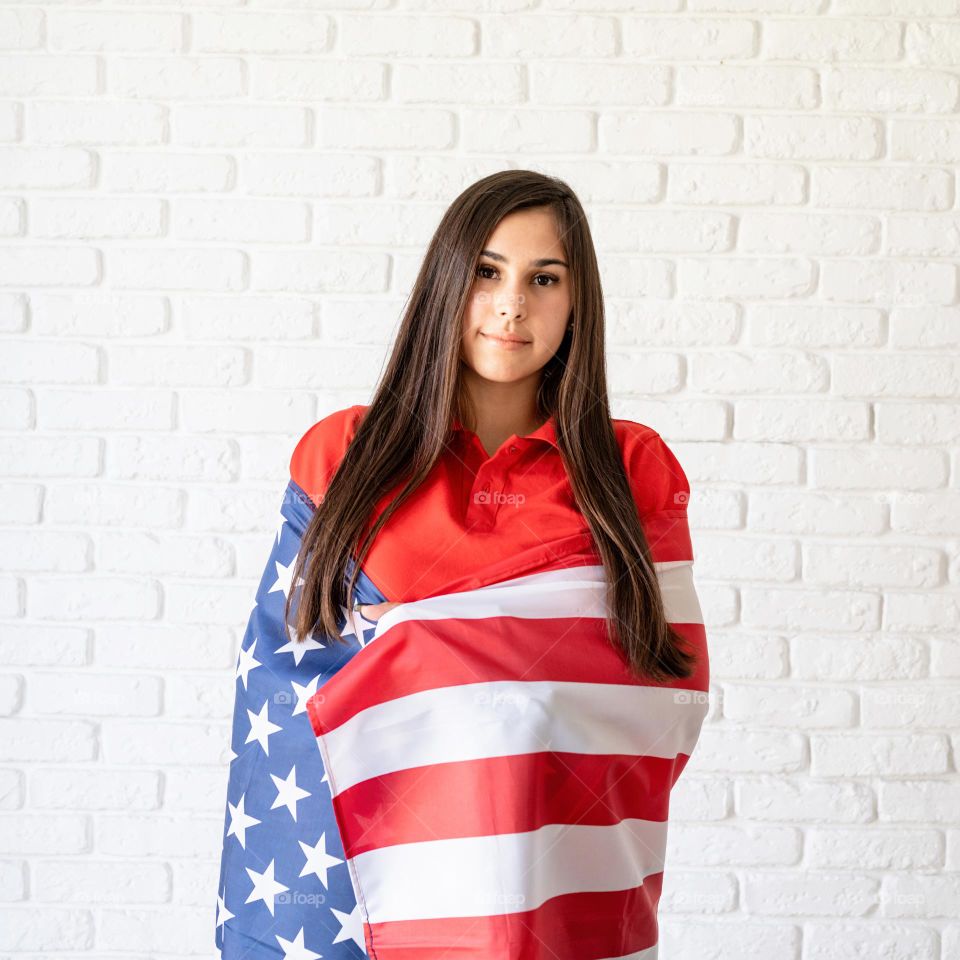 woman holding USA flag