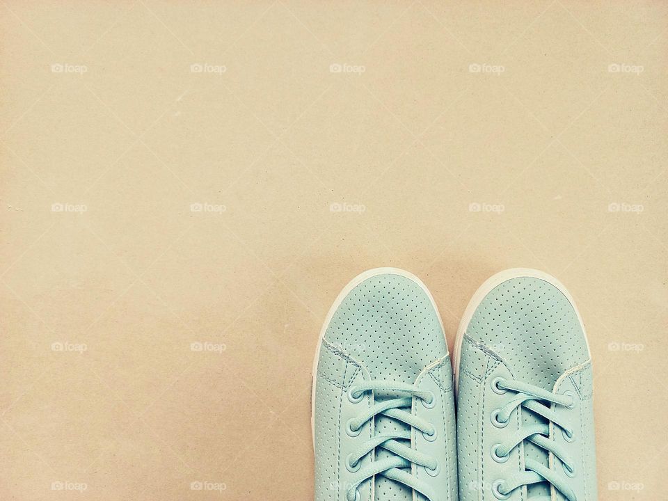 blue sneakers.