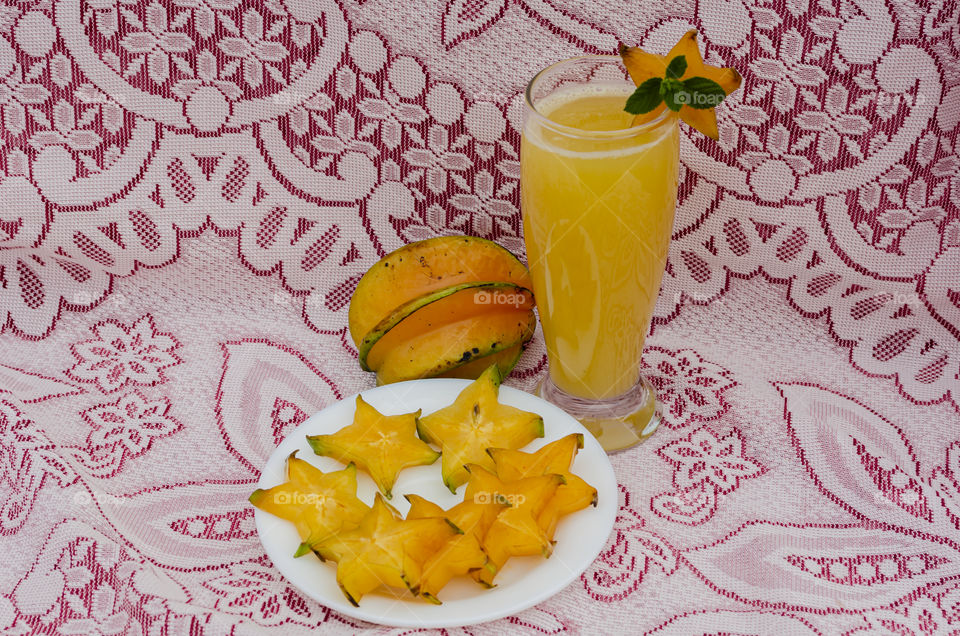 Starfruit Juice With Sliced And Whole Fruits