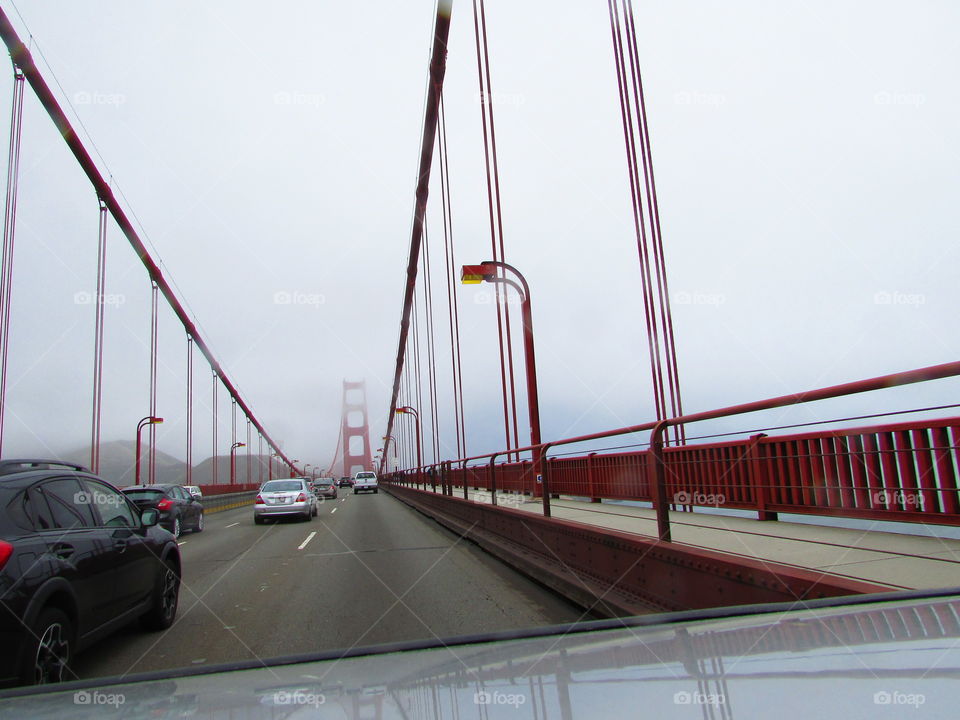 driving across the Golden Gate Bridge in San Francisco California