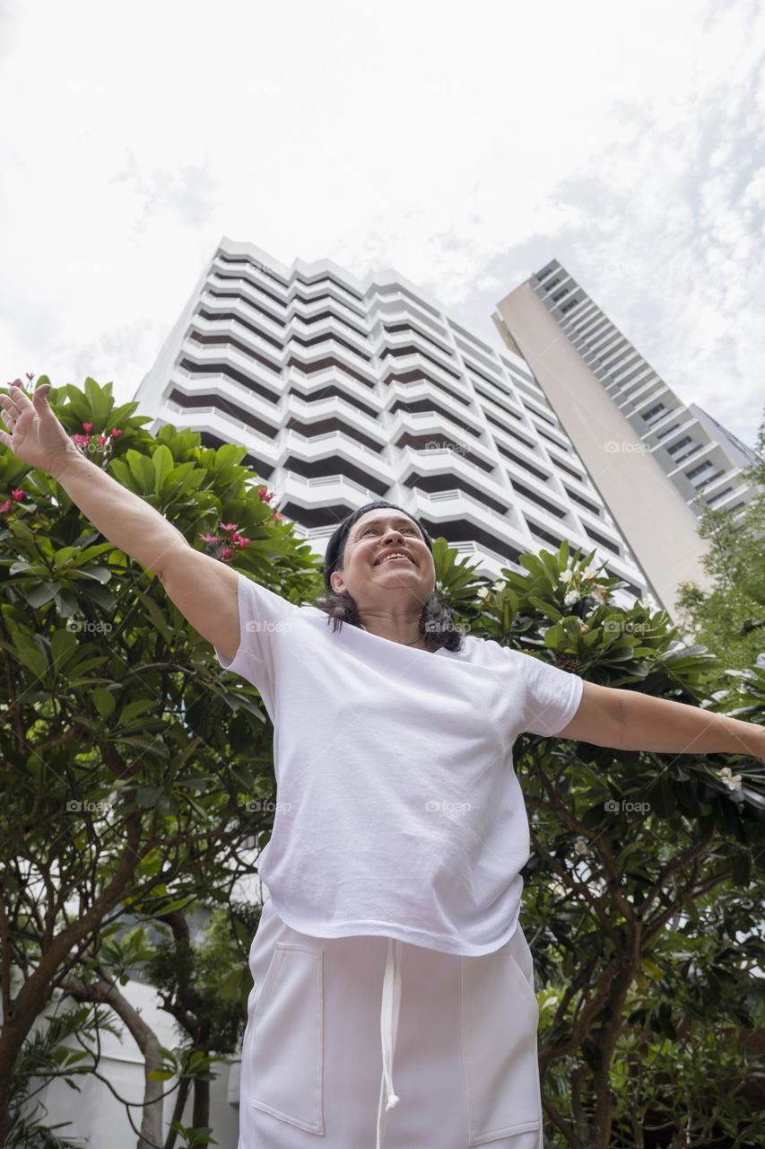 happy woman in tropical resort