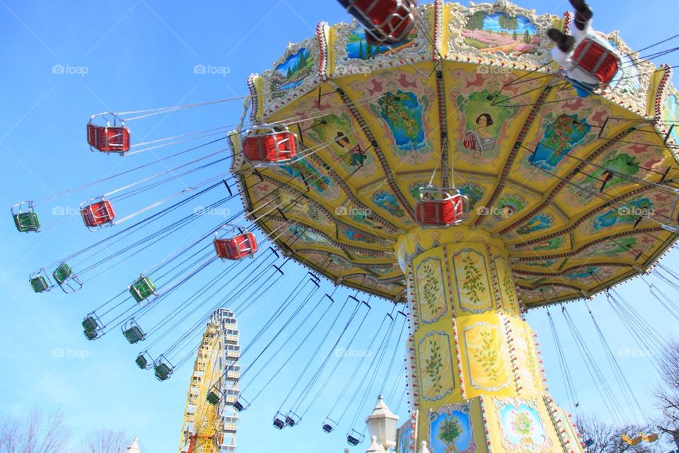Carousel against blue sky at Hamburg