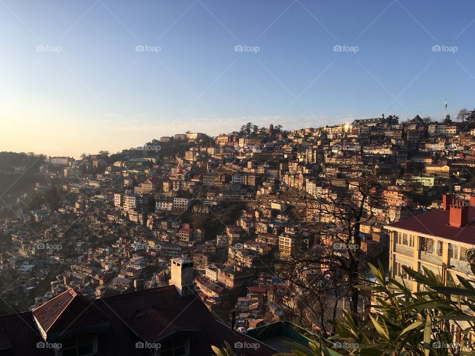 This was taken on a golden hour. A professional can spot that. I was lucky to be there to see the beauty of Shimla, India. A landscape photo taken at that hour was a luckiest one. Visit northern India in the month of february to witness its beauty.