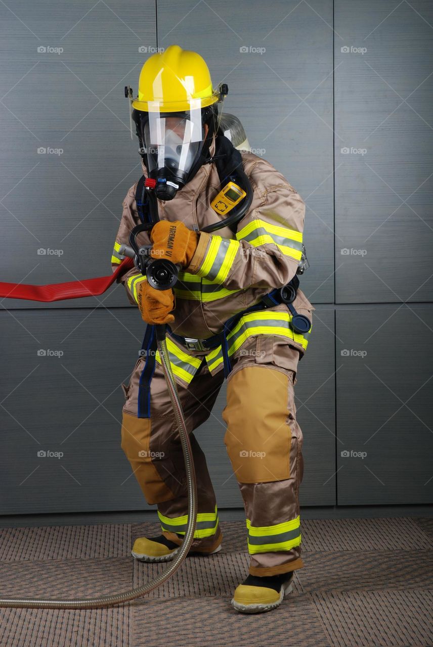 Photo of Firefighters ready to put out the fire