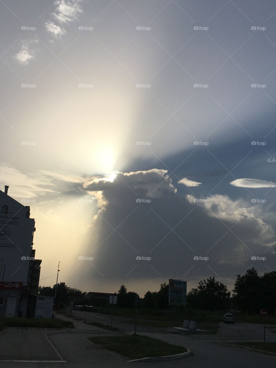 The sun is playing with the clouds