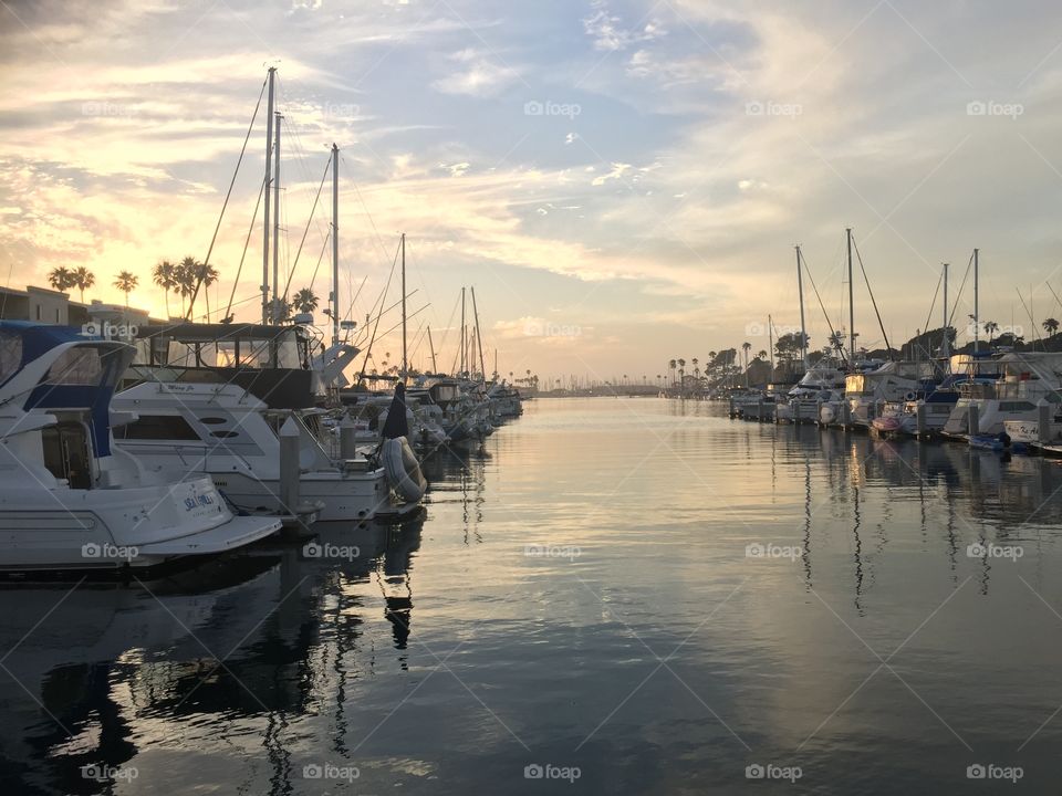 Boats docked at a pier in California