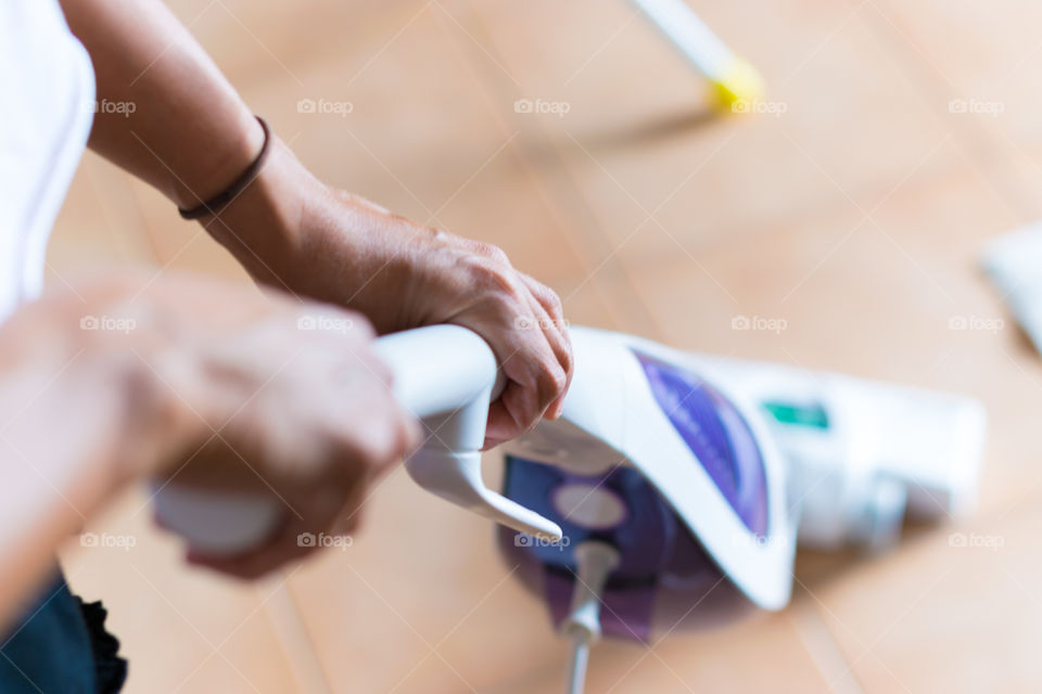 Woman while cleaning 