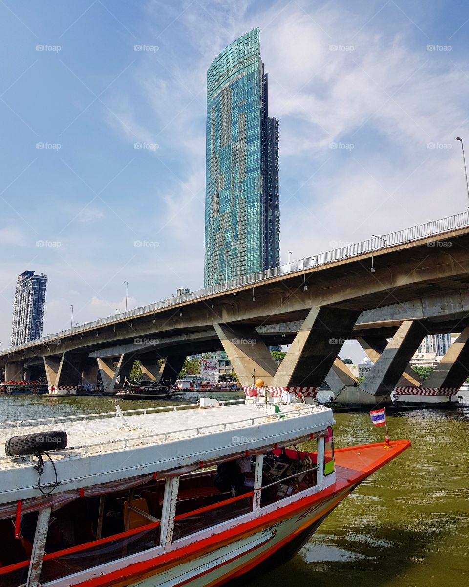Scenic view of river and cityscape at Bangkok