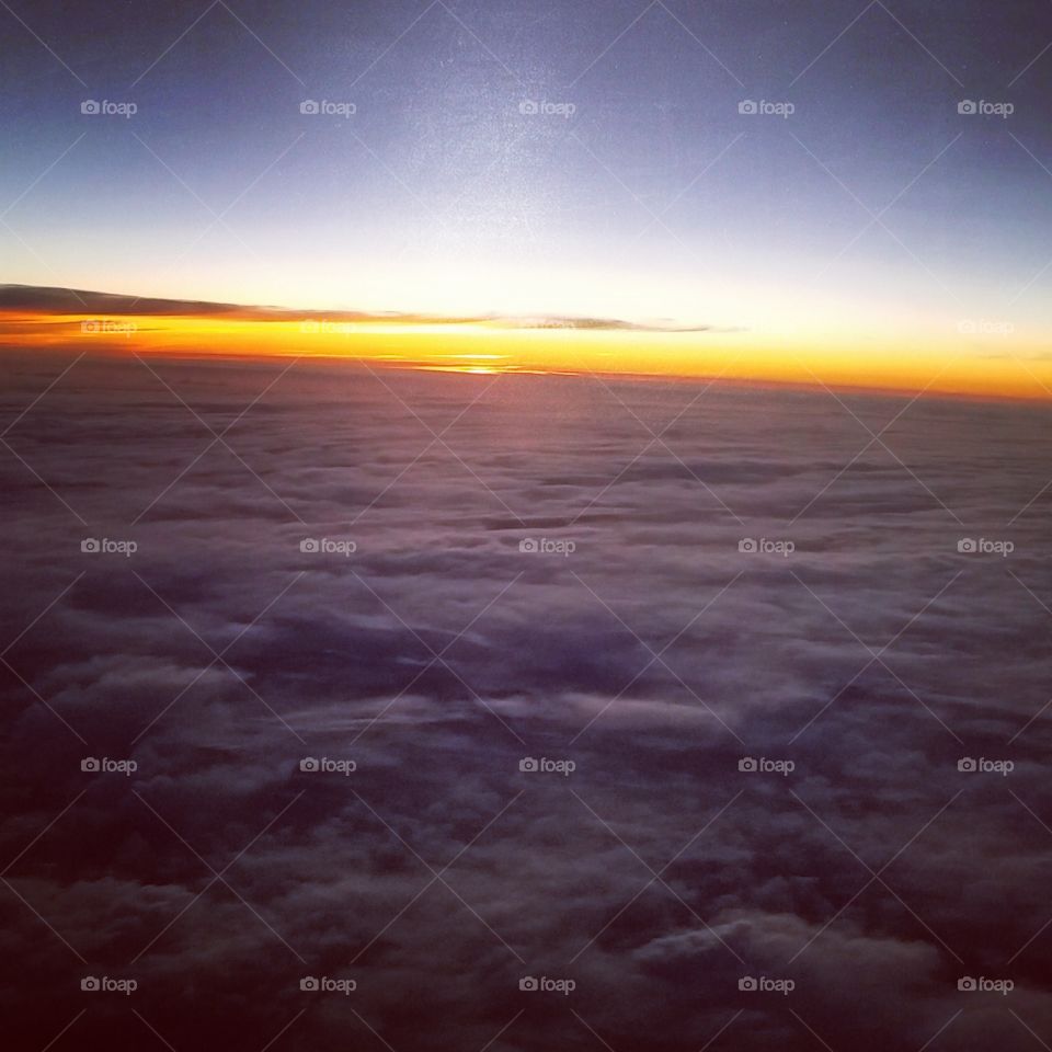 Sunset above the clouds
