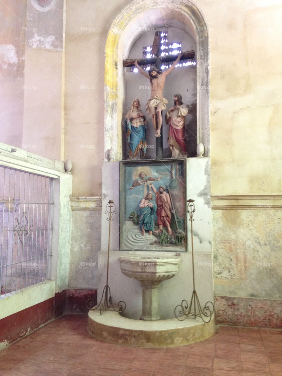this is an antque baptismal pool inside one of the oldest church in the philippines constructed by spain sometime 1800