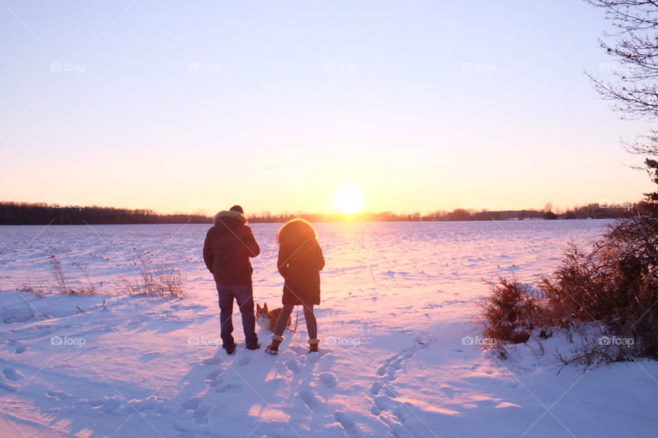 Family time in the winter sunset