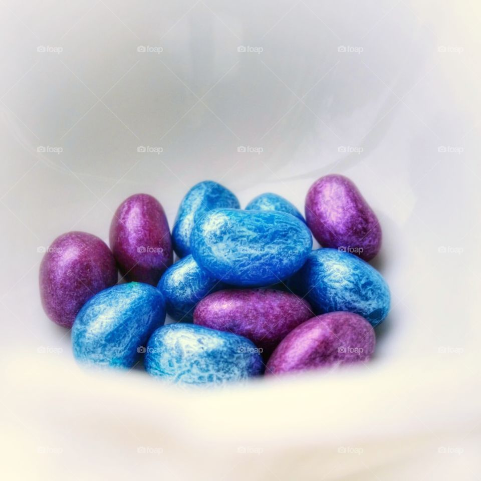 Bright blue and purple jelly beans clash of color