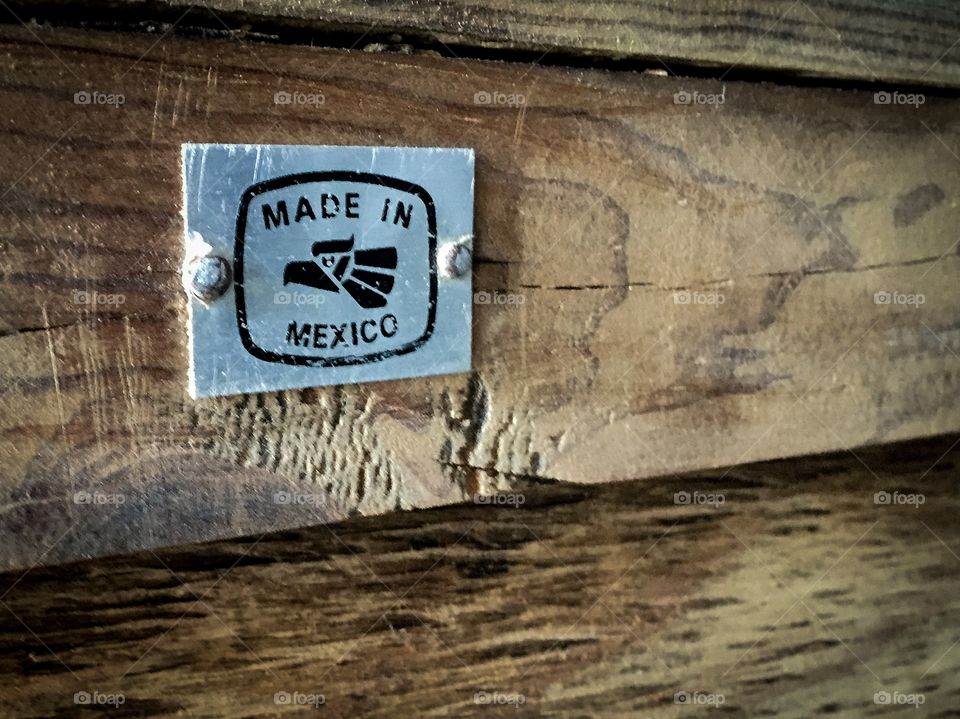 Made in Mexico plate on a wooden plate 