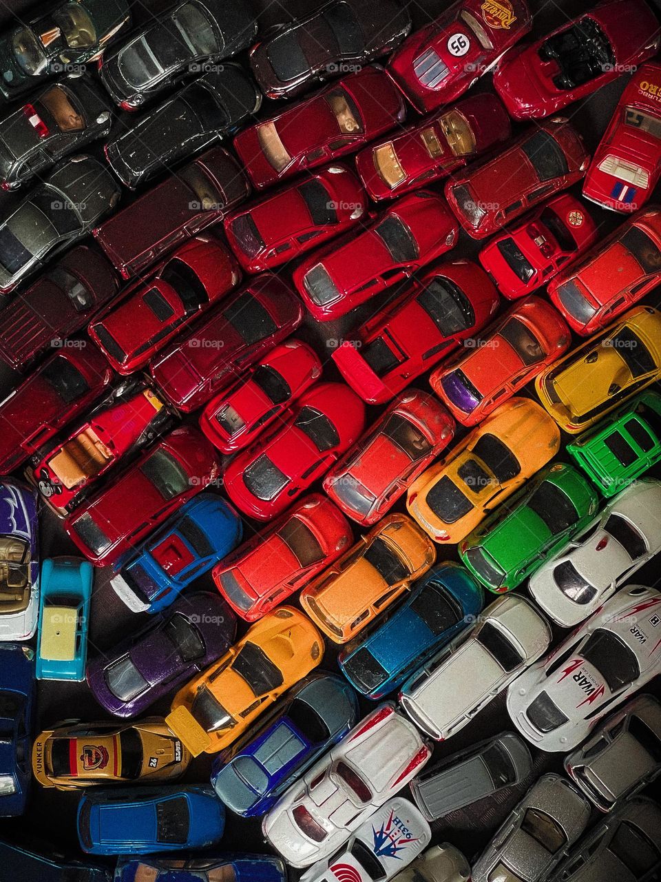 Colourful hot wheels in close up view in colour coding