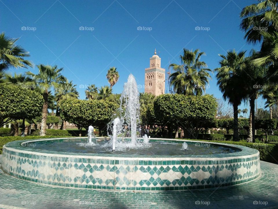 Beautiful fountain and view to Kotoubia minaret mosque.