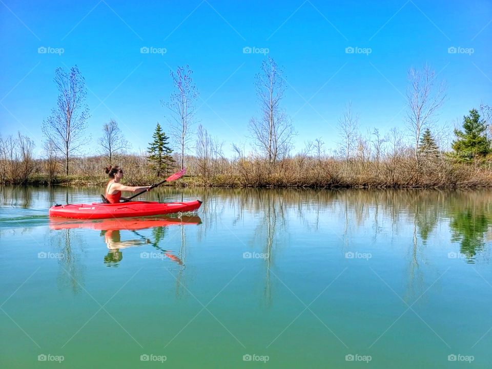 beautiful woman kayaking