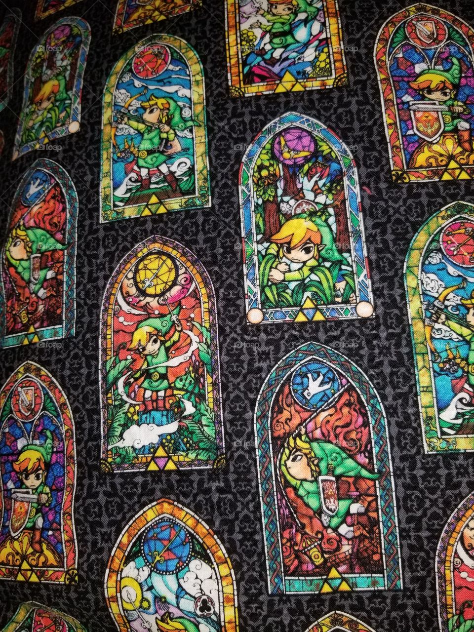 Combination of nostalgic video game on fabric and traditional stain glass windows
