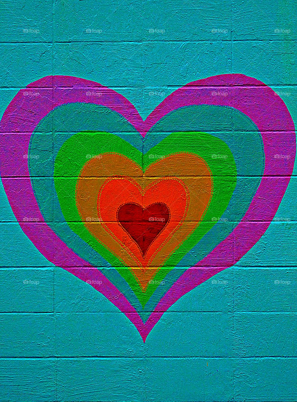 Colorful Hearts - The hearts here are a symbol for love. Often known as the seat of emotions, the heart is synonymous with affection.