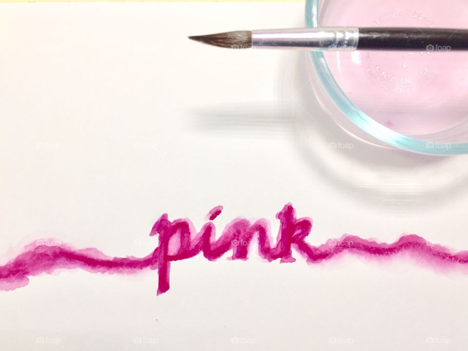 Pink text writen from pink water color