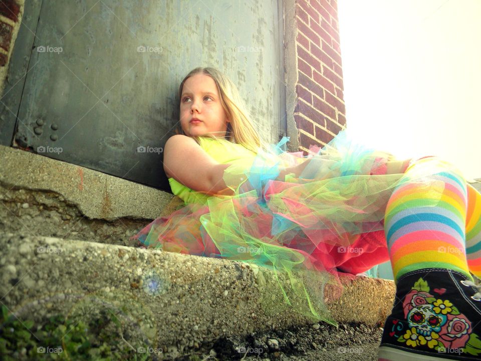 Girl wearing neon socks with bright tutu