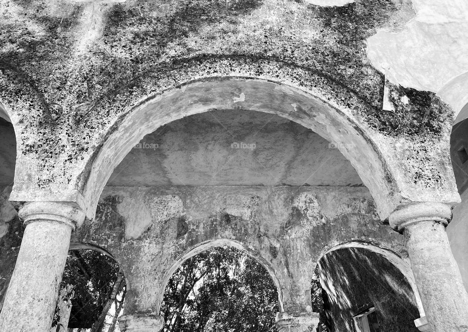 Arches in a wall in an old Spanish hacienda