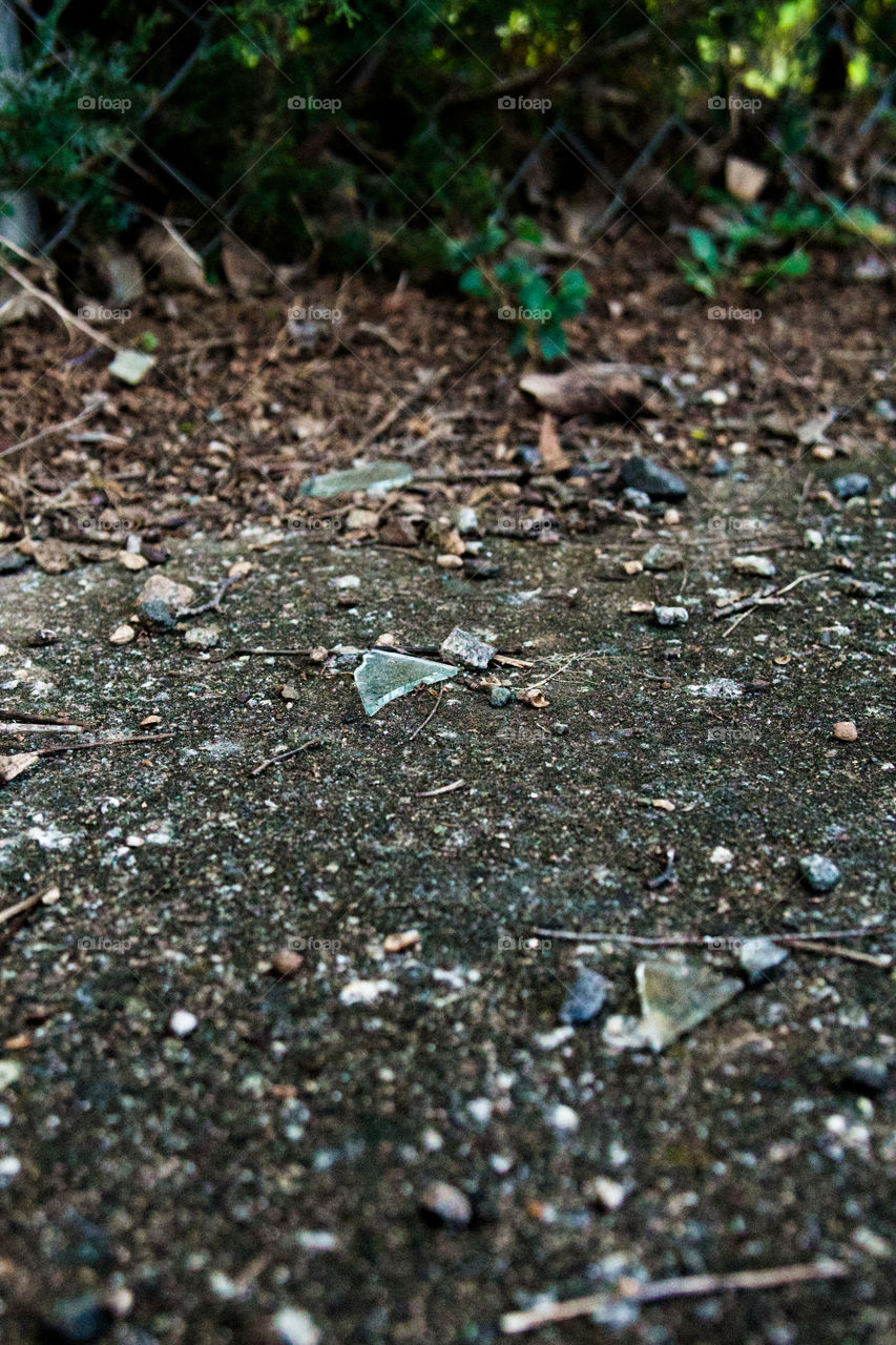  Glass shard spread across abandoned parking lot