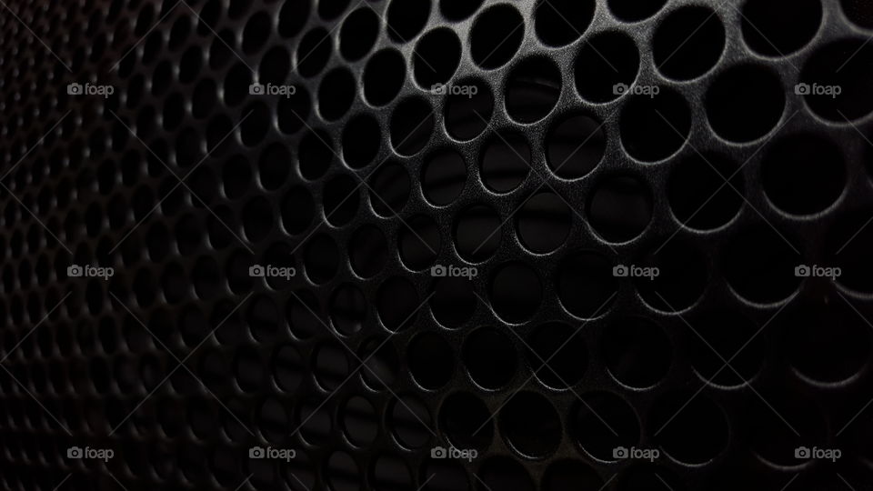 black audio speaker grid