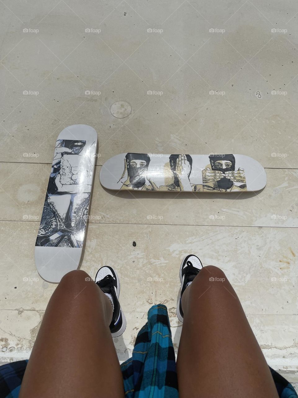 Girls legs with skateboard