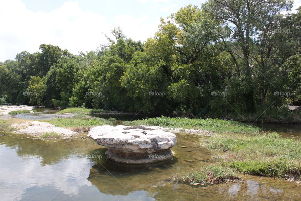 the round rock on the chiselm trail the city is named after if water from creek was over rock it was not safe to pass