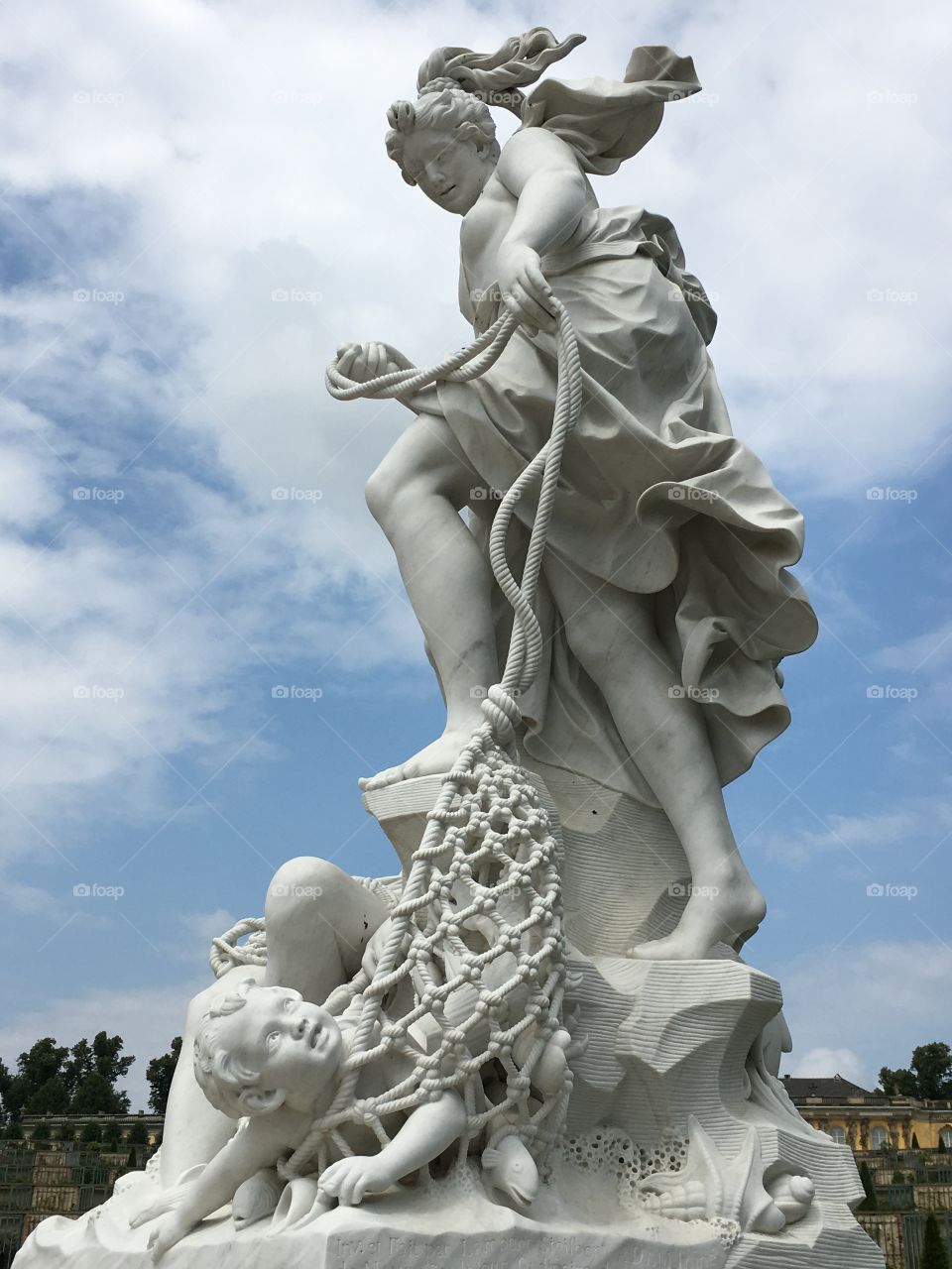 Statue with child in net