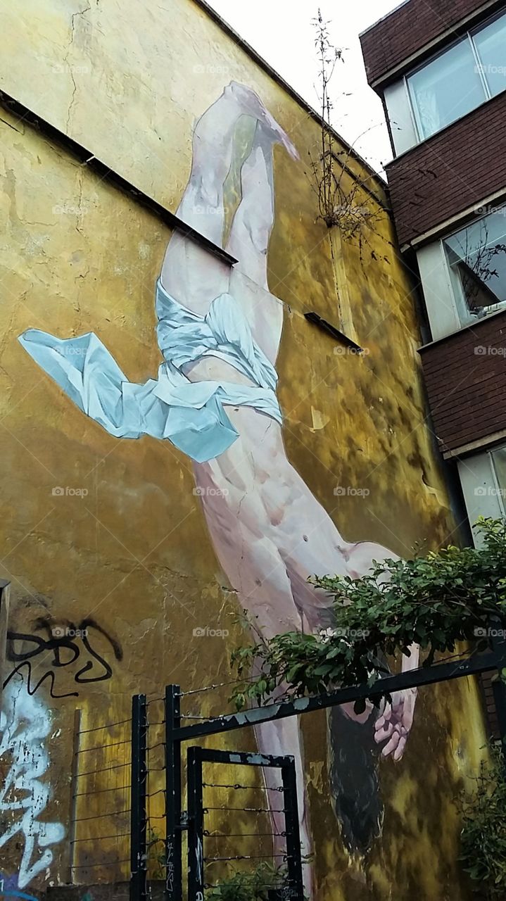 Man Hanging Upside Down