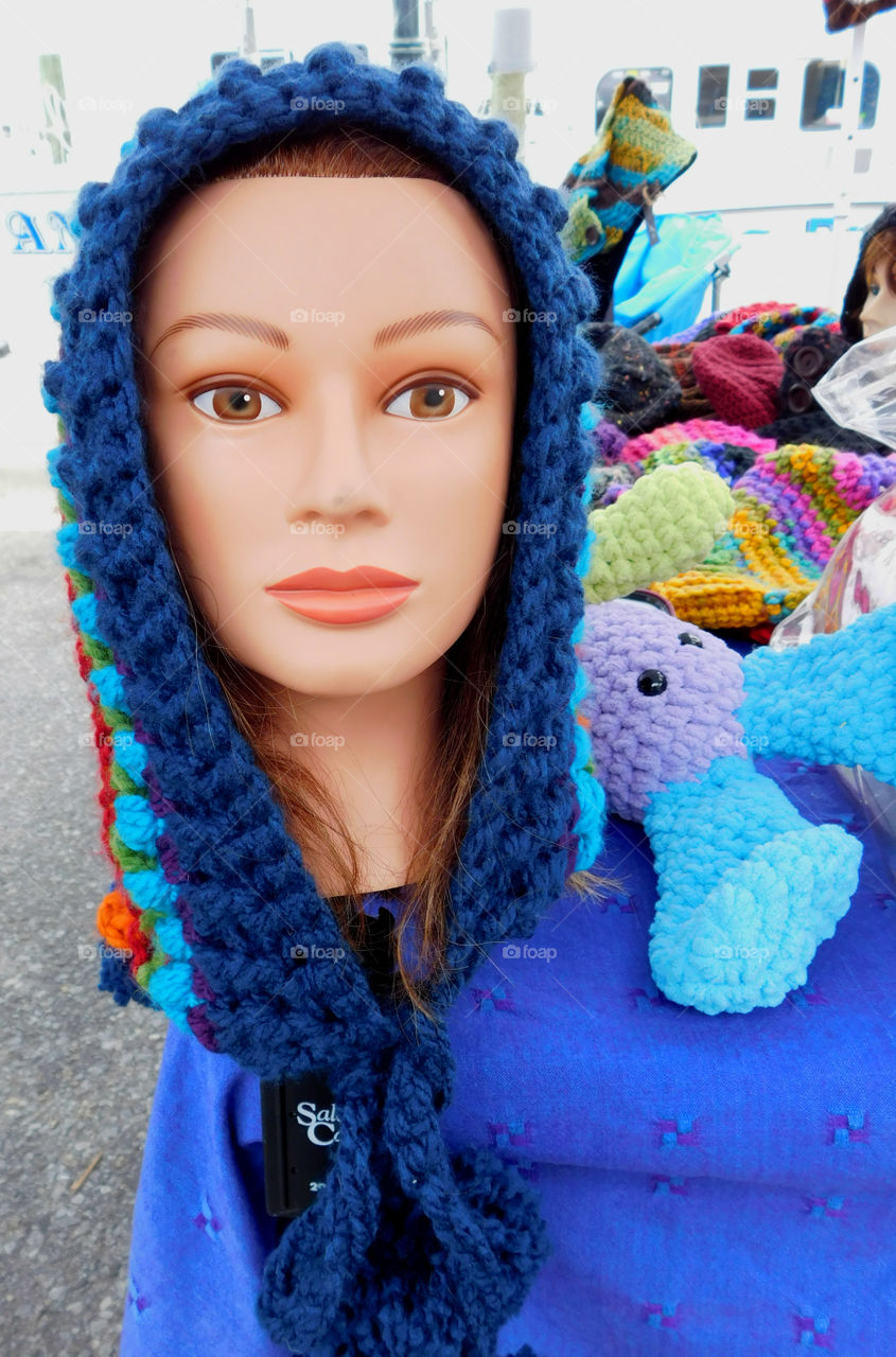 Mannequin display of knitted hats!