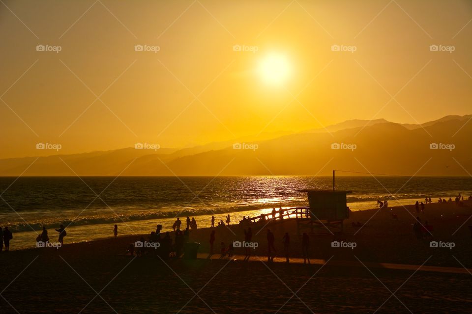 Stunning sunset at the Santa Monica Pier in Los Angeles 