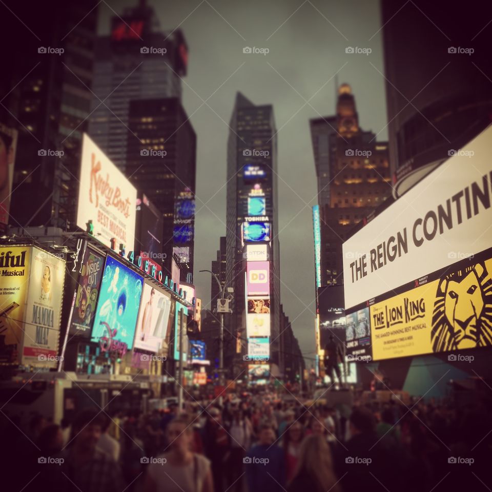 Time square. Whilst sat on the steps in new Yorks Time square 