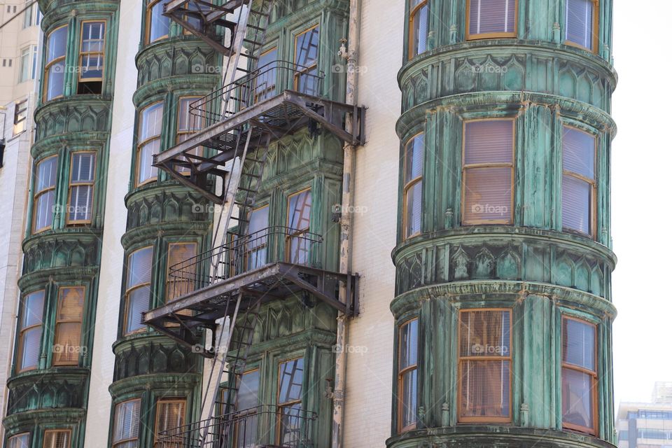 Old green and white painted building 