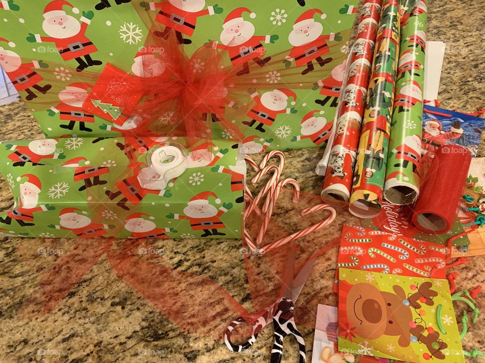 Christmas wrapping, candy canes and Christmas music getting ready for Santa!
