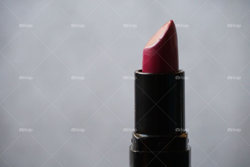 Unexplained lipstick. Macro zoom. Natural light.