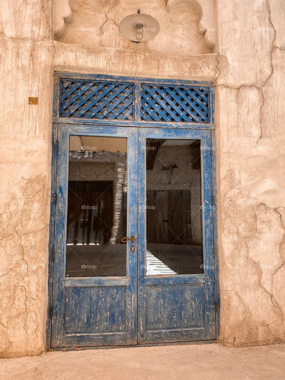 “Blue antique door “ a very unique antique door with an incredible carving on it . Hand made blue antique door 