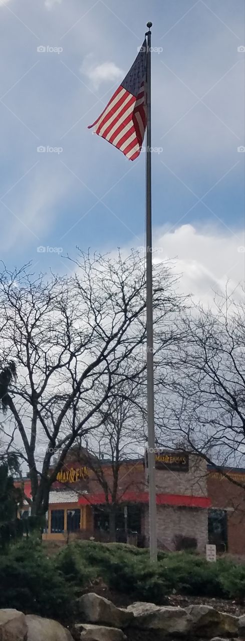 American flag in the sun in front of Max & Erma's