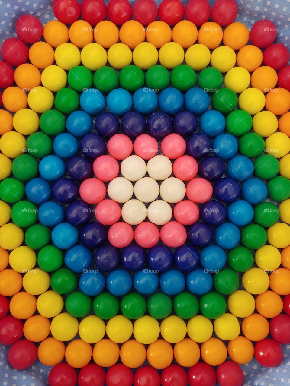 Hexagon shape in an Array of Colorful Rainbow Gumballs