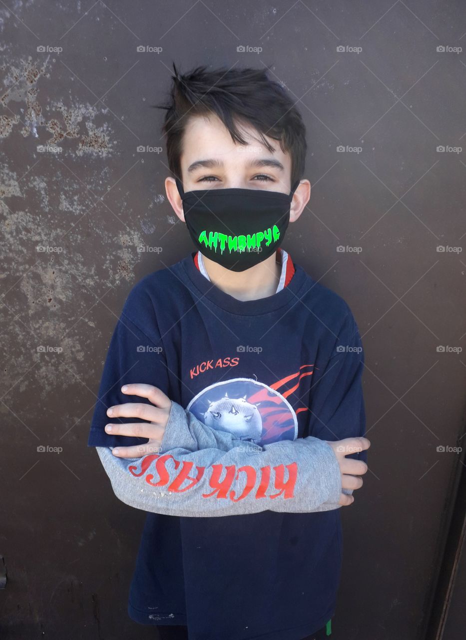 boy with mask on his face