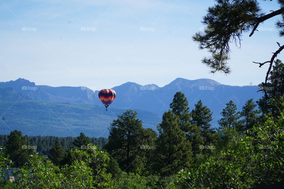 Mountains behind balloon flying