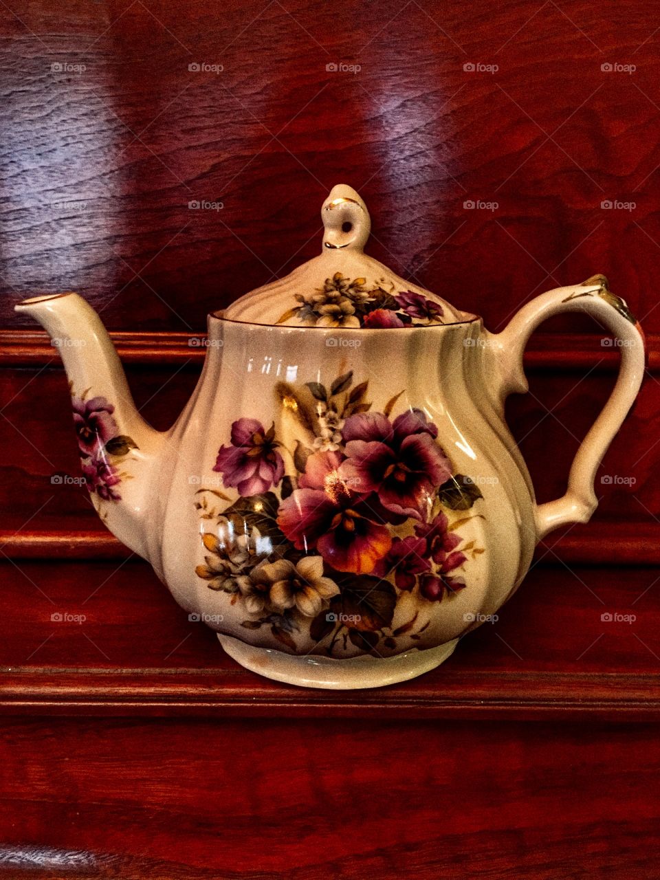 Close up of teapot on table