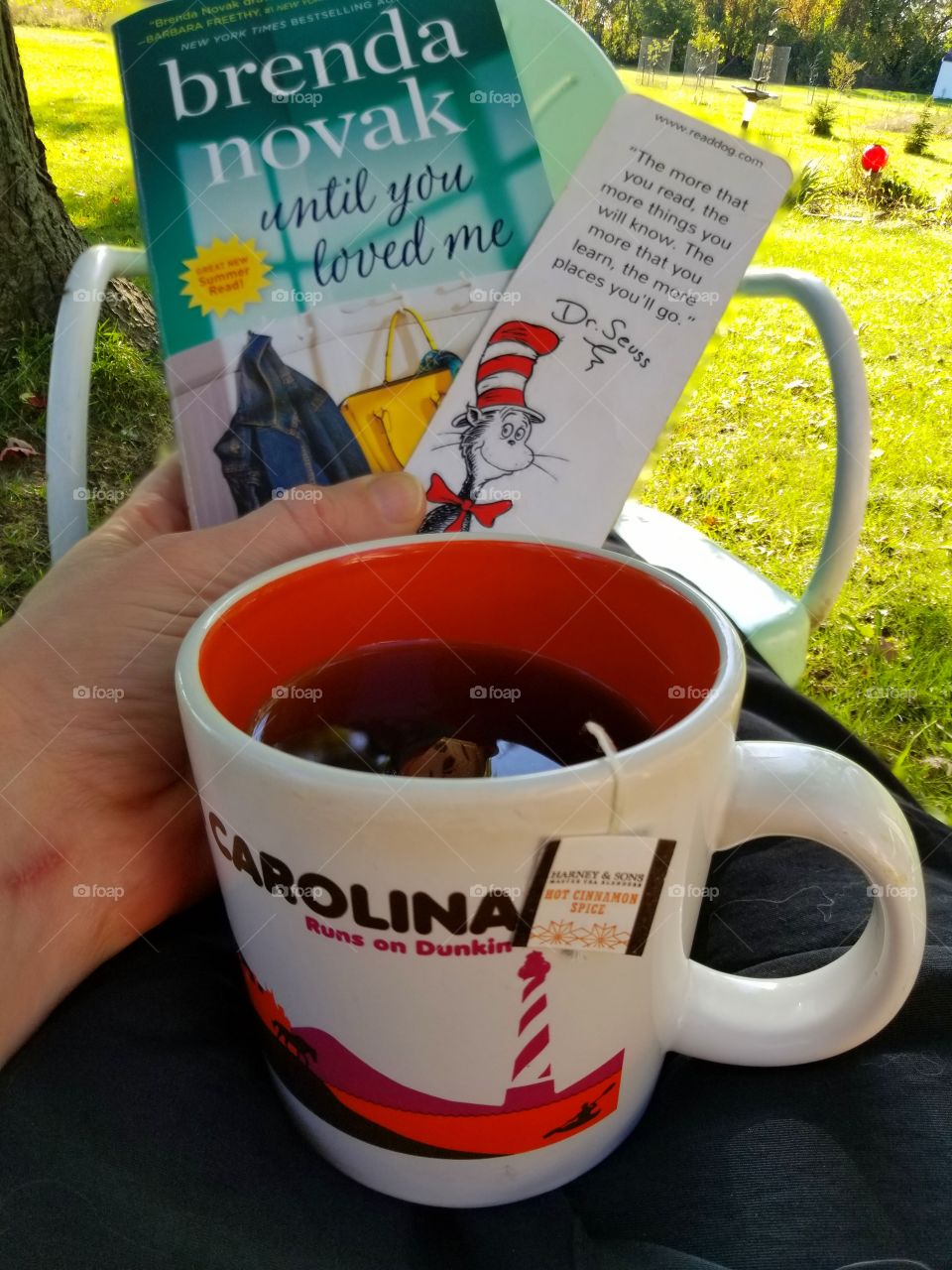 Next read, Brenda Novak's Silver Springs Novel, Until You Loved Me with a cup of Harney & Sons Hot Cinnamon Spice tea in my North Carolina Runs On Dunkin' cup.