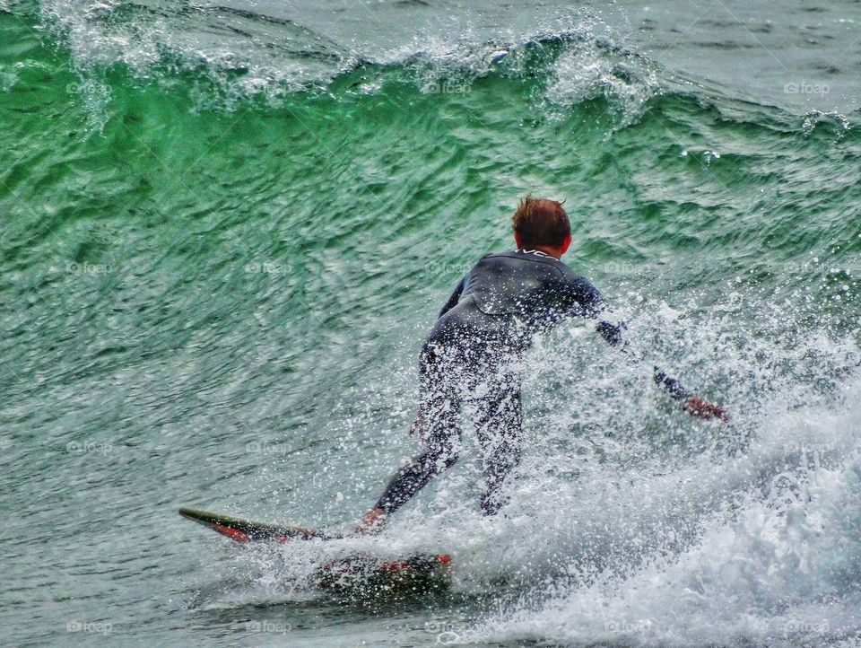 Surfer in Pacifica, California
