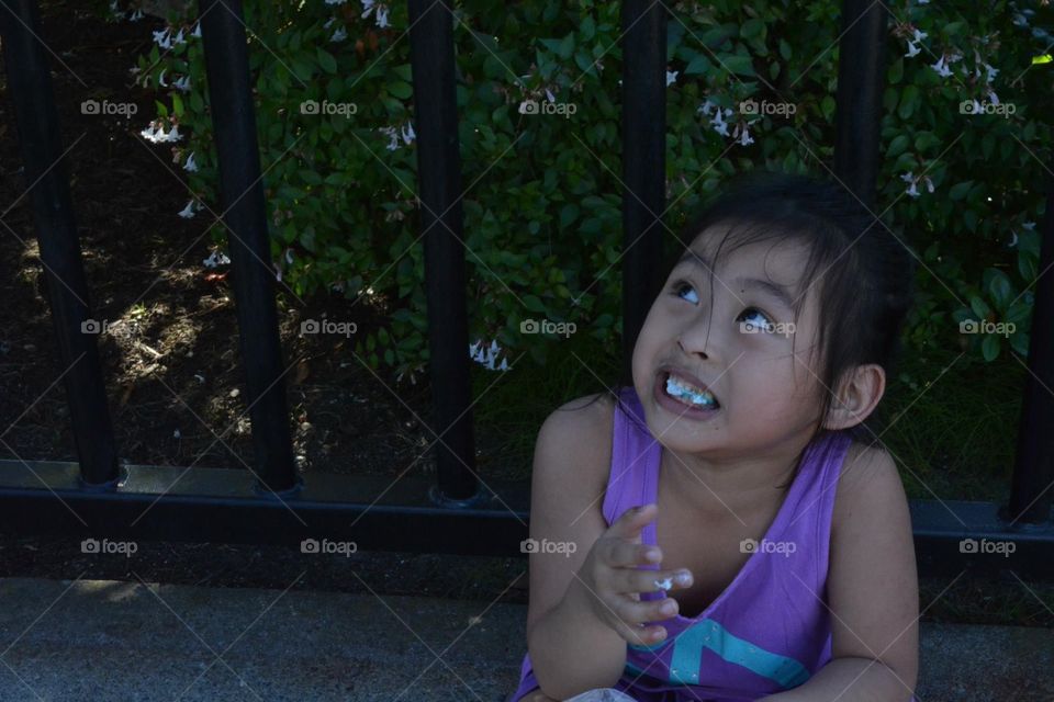 Her mom caught her eating cotton candy. 