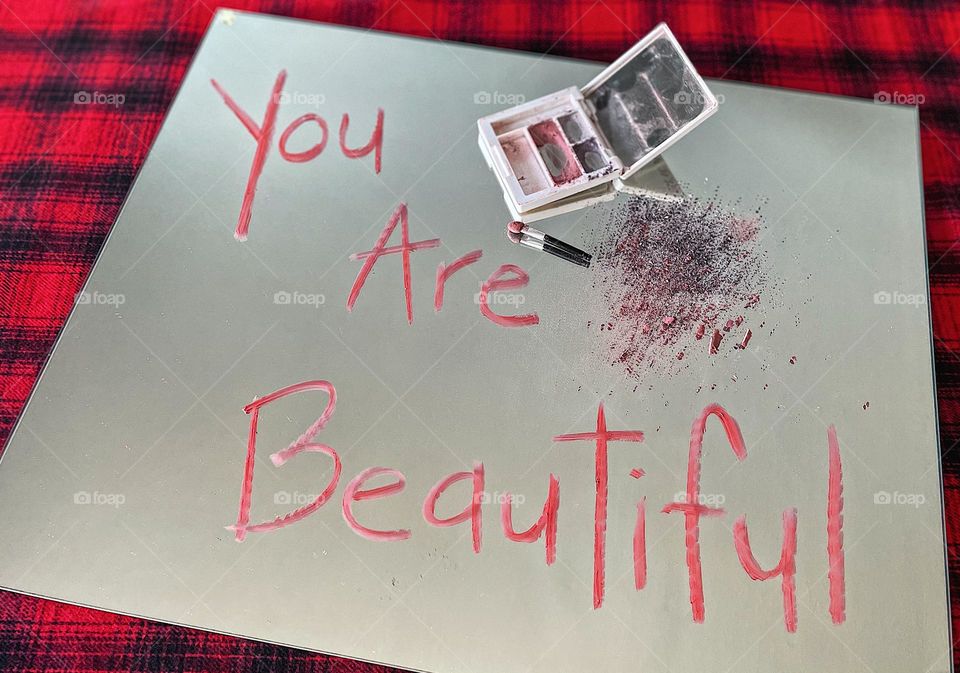 You are beautiful message on the mirror, my favorite makeup is eye shadow, positive vibes for women, Clinique eye shadow on the mirror, reflections of make up on the mirror, writing with lipstick on a mirror, unique perspective 